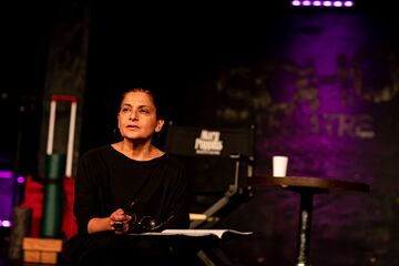 woman reads from some paperwork