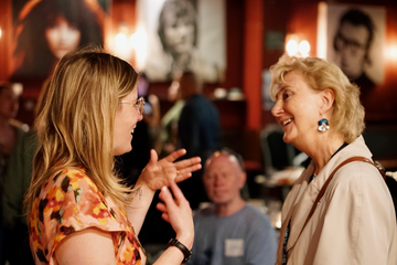two women network together