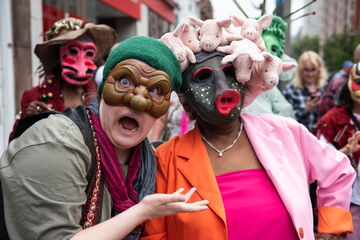 Two masked characters in the our masquerade project in Westminster in 2024.