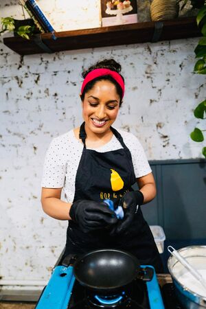 A Sri Lankan Woman making Hoppers