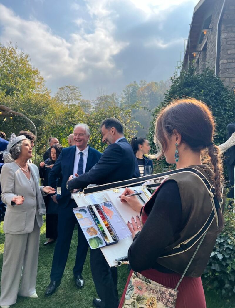 Anna live sketching at a wedding 