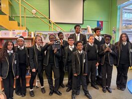 group of students with a clapper board