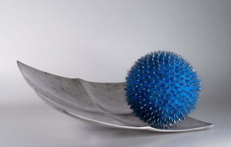 'Service Please' sculpture, spikey wrapped woolen ball on tilted aluminium platter