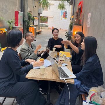 A group of people around a table