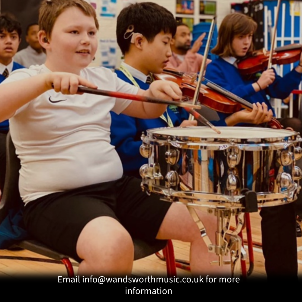 Child playing the drum