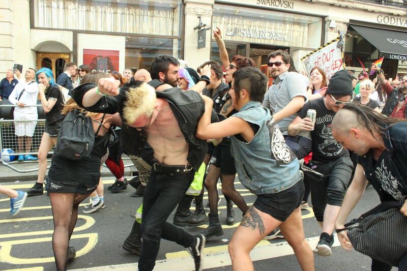 An Image Of Punks Protesting In The Streets Of London