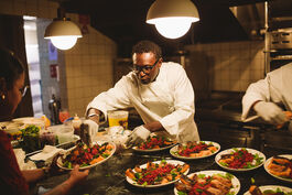 A Chef cooking in a professional kitchen