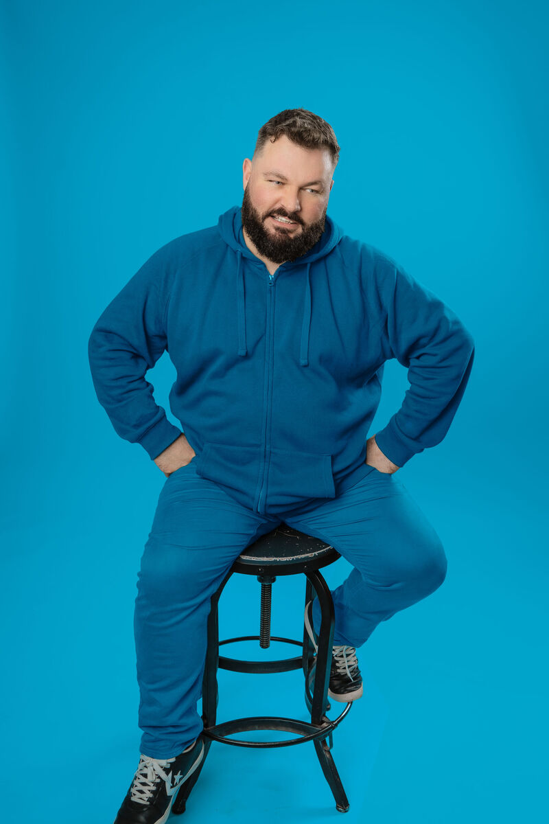 Bearded man after laughing. 