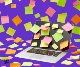 Laptop covered in post-it notes 