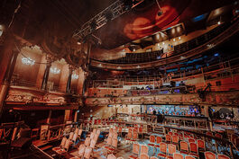 big building with lots of seats built up 
