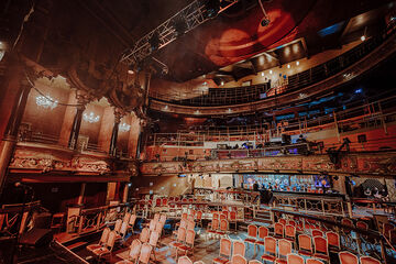 big building with lots of seats built up