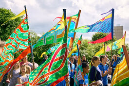 colourful flags and crowd at Urban Flow