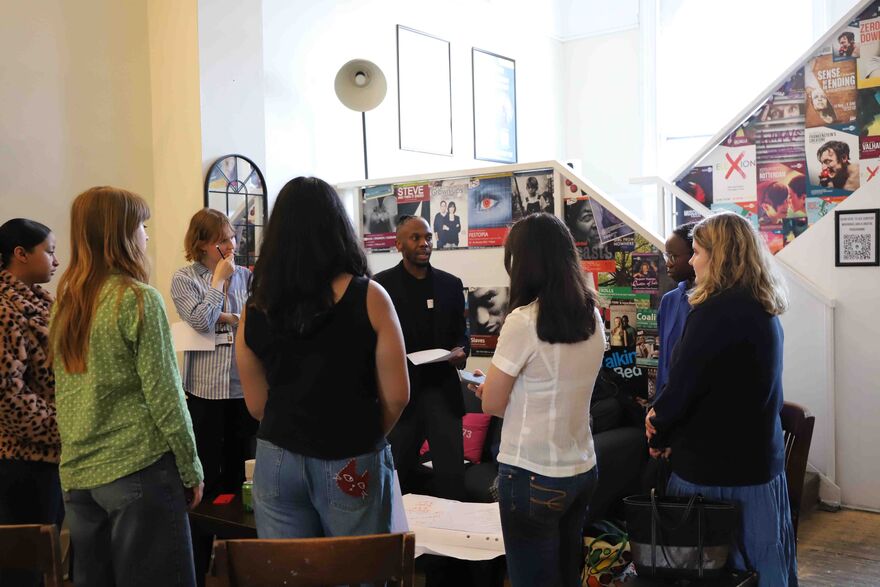 young people stand in a group