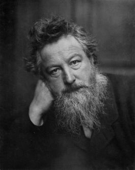 Image shows a photographic portrait of William Morris by Frederick Hollyer. Source: wikimedia, public domain