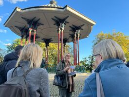 Walkers with walk guide, CWA dagger listed crime fiction author, Julie Anderson, at Clapham Common Bandstand