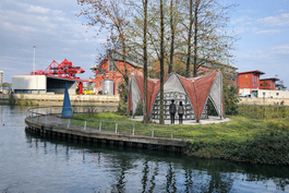 Credit: RCA / Hochschule Hannover University - illustrated image of a pavilion hidden amid trees on The Spit 