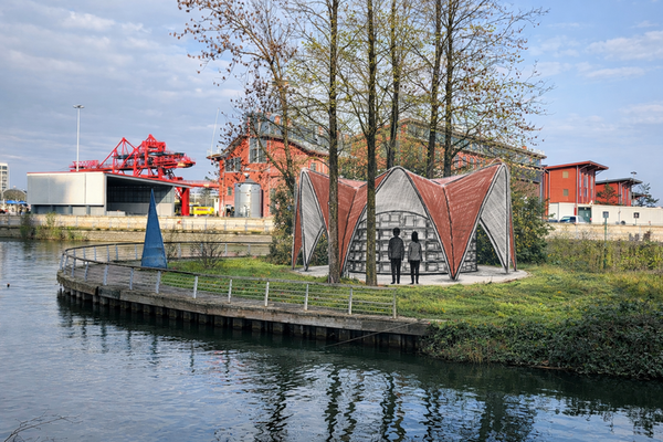 Credit: RCA / Hochschule Hannover University - illustrated image of a pavilion hidden amid trees on The Spit 