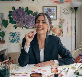 Anna in her studio while painting