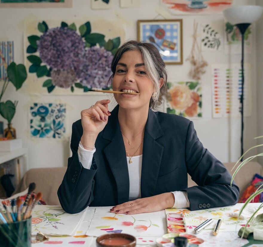Anna in her studio while painting