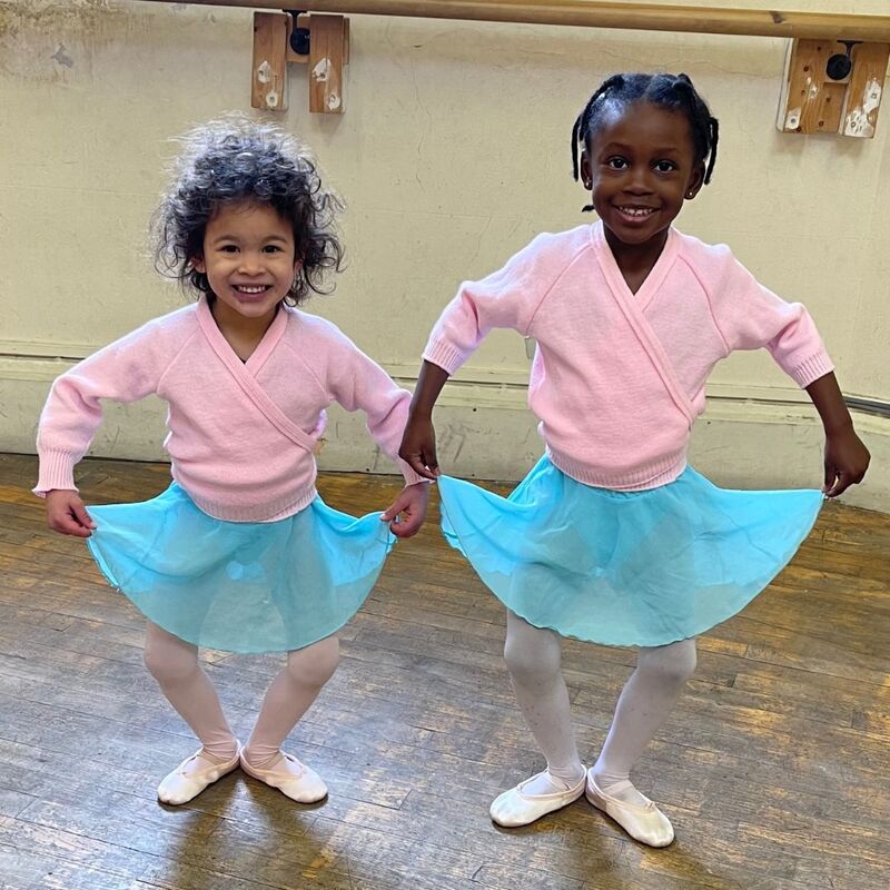 Two Pre-Primary Ballet children practising their pliés