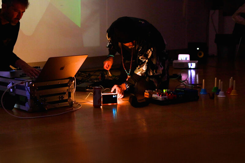 Kulvir and Andy Harper performing Clouds: Elevated in the Lightbox Gallery, Leicester.