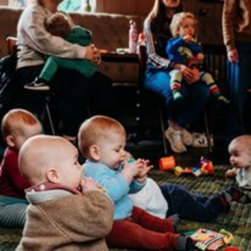 Babies at a Crib Notes Choir Rehearsal