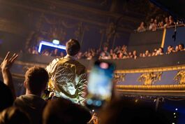Frontman of indie pop band Saint Motel performing amidst the crowd at Electric Brixton