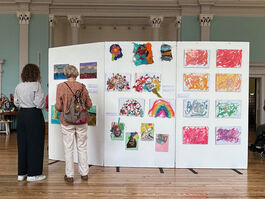 Exhibition panel with lots of art