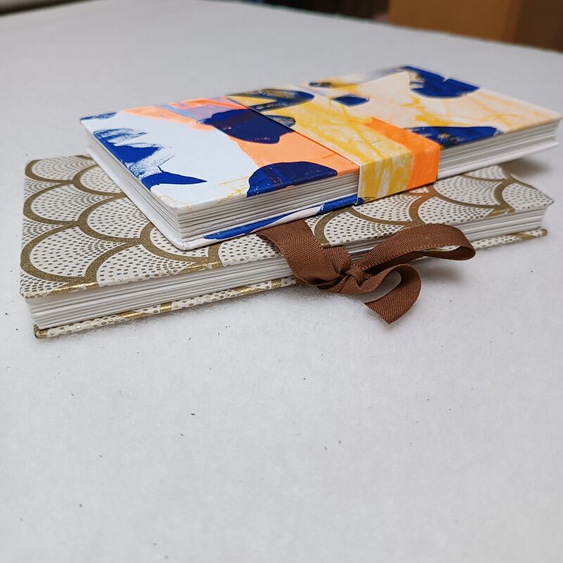 Concertina books made from original screen prints.