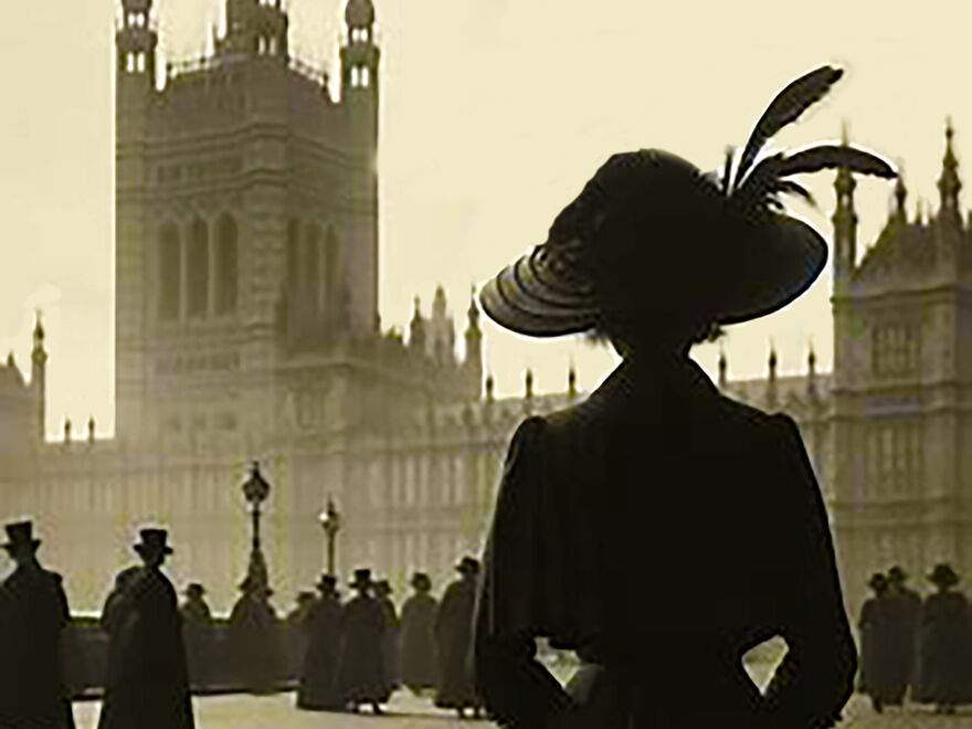 Constance in profile and looking from Westminster Bridge at the Houses of Parliament