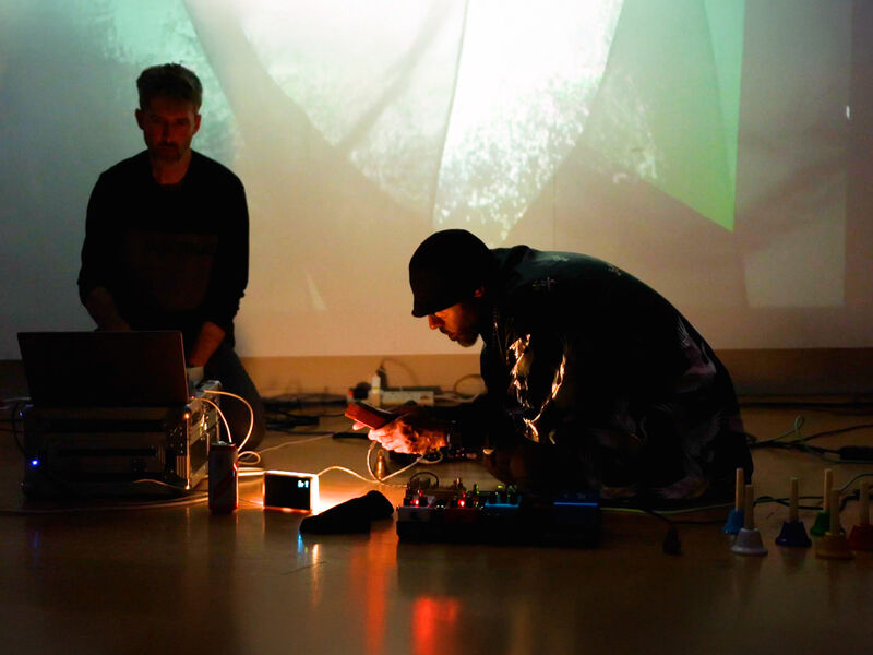 Kulvir and Andy Harper performing Clouds: Elevated in the Lightbox Gallery, Leicester.