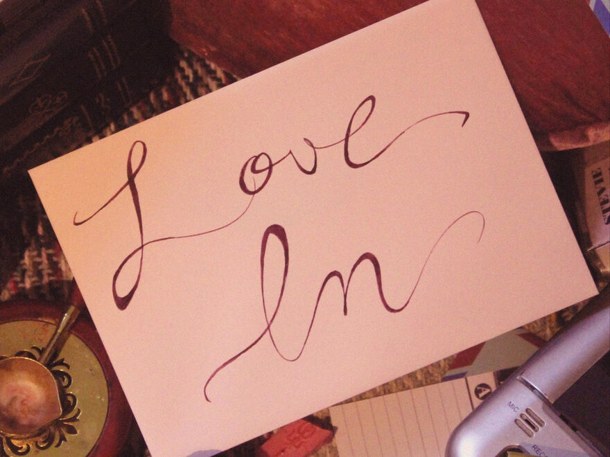 A pink envelope with