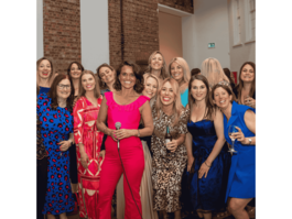 A group photograph with Maxyne Ryan singing at The Female Founders Summit