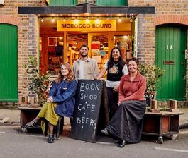 Image of people gathered outside morocco bound bookshop