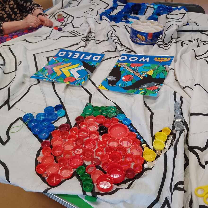 An Image Of Bottle Caps And Lids Used To Create Art