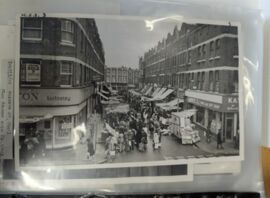 Black and white photo of busy market