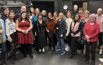 Group of people smiling at camera
