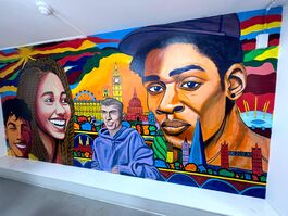 A Brightly Coloured Mural With Smiling Faces And Colourful London Skyline.By Garlic Designs