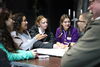 group of young people in discussion