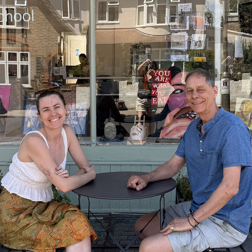 Father and daughter, Crispin and Esme Green, outside sprout Arts, smiling