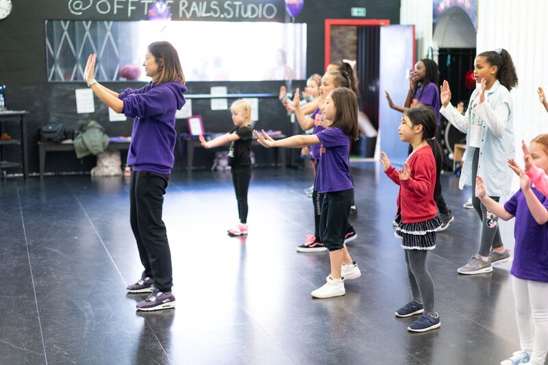 Teaching a children's street dance workshop