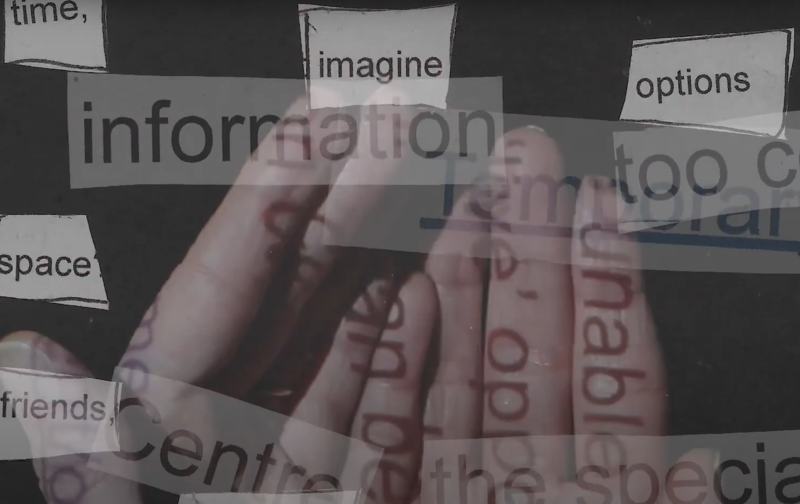 Hands together with overlaid cut out faded text 