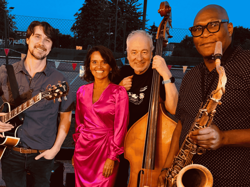 Group photo of jazz quartet showing guitar sax and double bass
