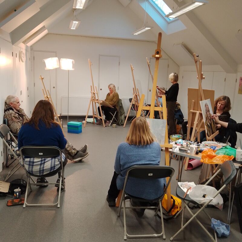 Drawing AT Woodfield Pavilion Artists Sit With Easels