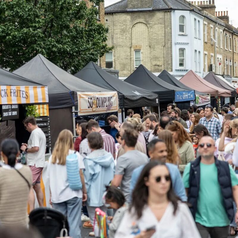 Market stalls selling food and produce 