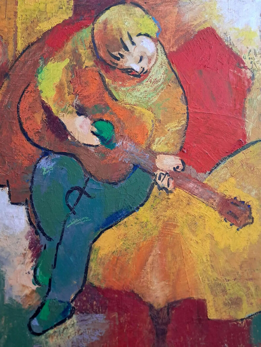 Painting of child playing a guitar