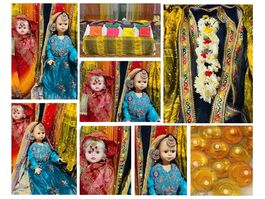 This image shows the South Asian wedding dresses and jewellery and wedding setup