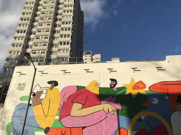 a recently painted mural on the exterior of Southside Shopping Centre near King George's Park